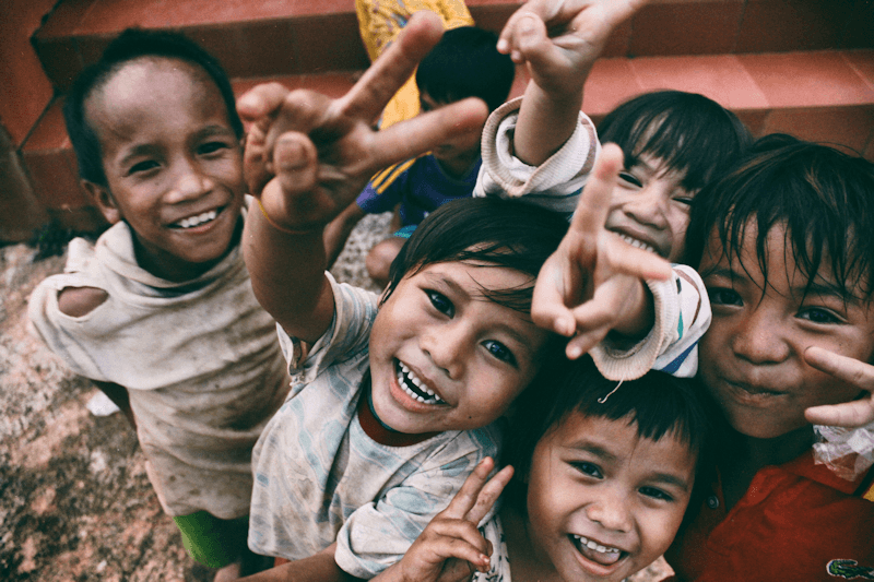 Children smiling representing hope for the future